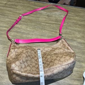 Tan and pink coach crossbody